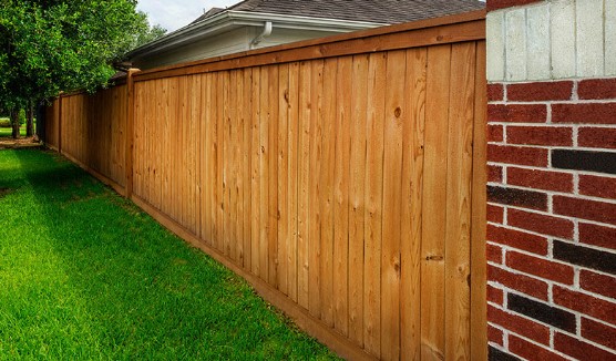 wooden fence at the side of a property