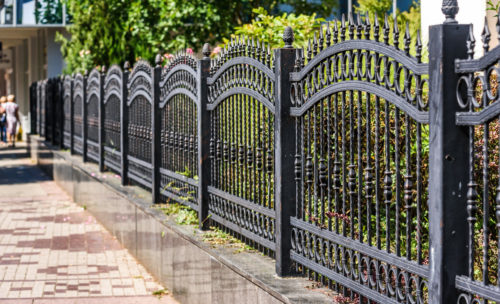 iron fence at the side of the street