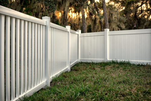 vinyl fence at the back of a home