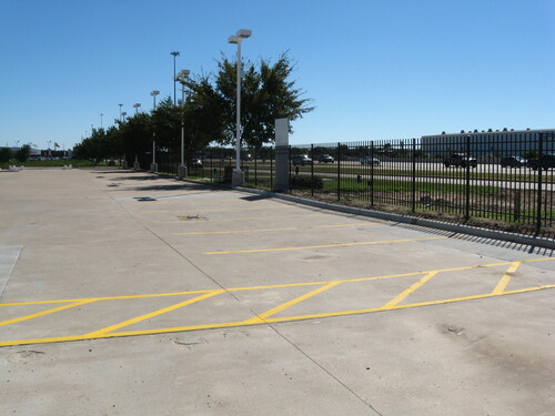 wrought iron fence in the woodlands