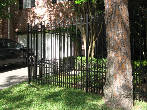 wrought iron fence in front of a katy home