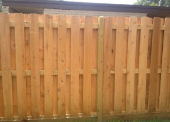 wood fence at a house