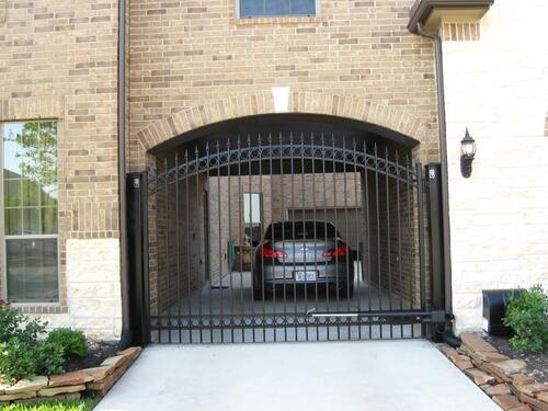 Narrow Iron Arch Drive Gate