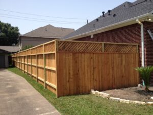 Griffin Fence team installing new picket fence